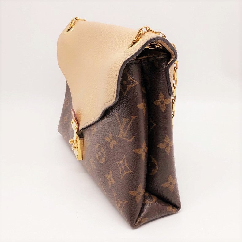 Slightly used Louis Vuitton Wristlet Pouch / clutch LV